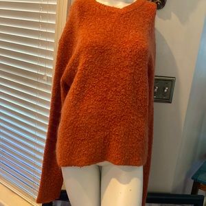 Eric Stewart acrylic& wool sweater. Burnt orange womens size medium. V neck